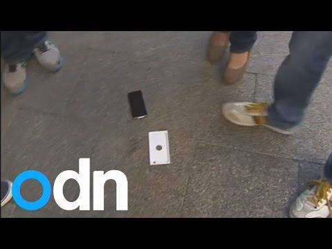 Watch the moment Australian man drops iPhone 6 after queuing all night