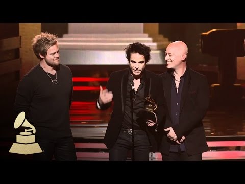 Train accepting the GRAMMY for Best Pop Duo or Group at the 53rd GRAMMY Awards | GRAMMYs