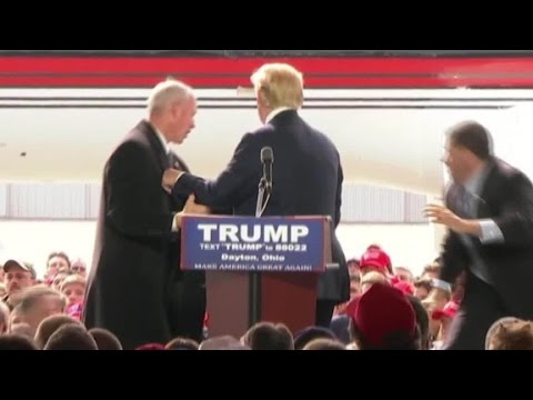 Trump swarmed by security on stage