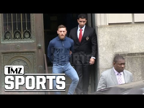 Conor McGregor Leaves Police Station In Handcuffs | TMZ Sports