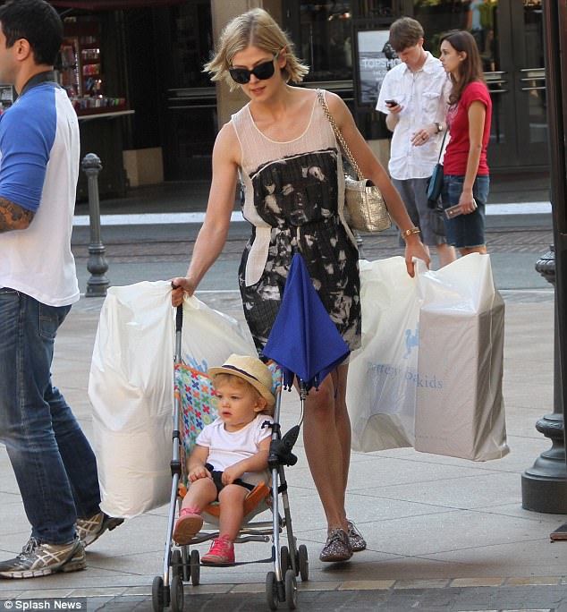 Robie Uniacke's wife Rosamund Pike with their first child Solo